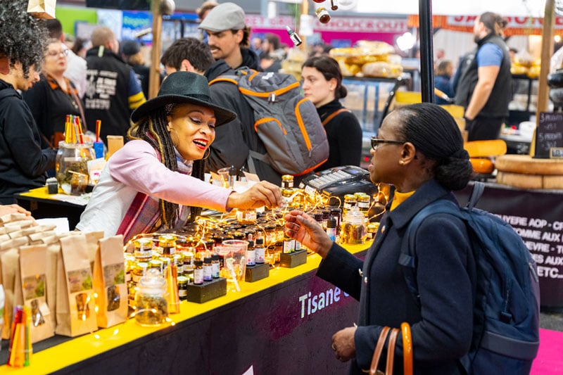 Exhibitor presenting products from the Caribbean