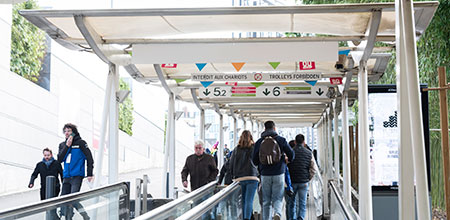 Visitors on the escalators at the outside entrance